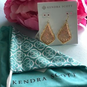 Kendra Scott rose gold and gold earrings